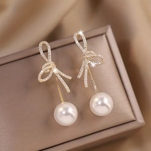 Gold Bow with Faux Diamond Pearl Drop Earrings